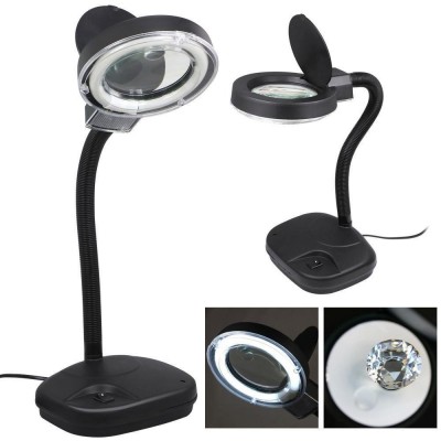 Workbench lamp with magnifier